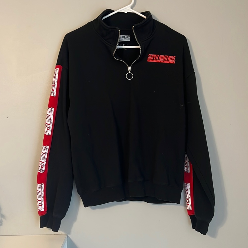 Super Nintendo quarter zip long sleeve top.